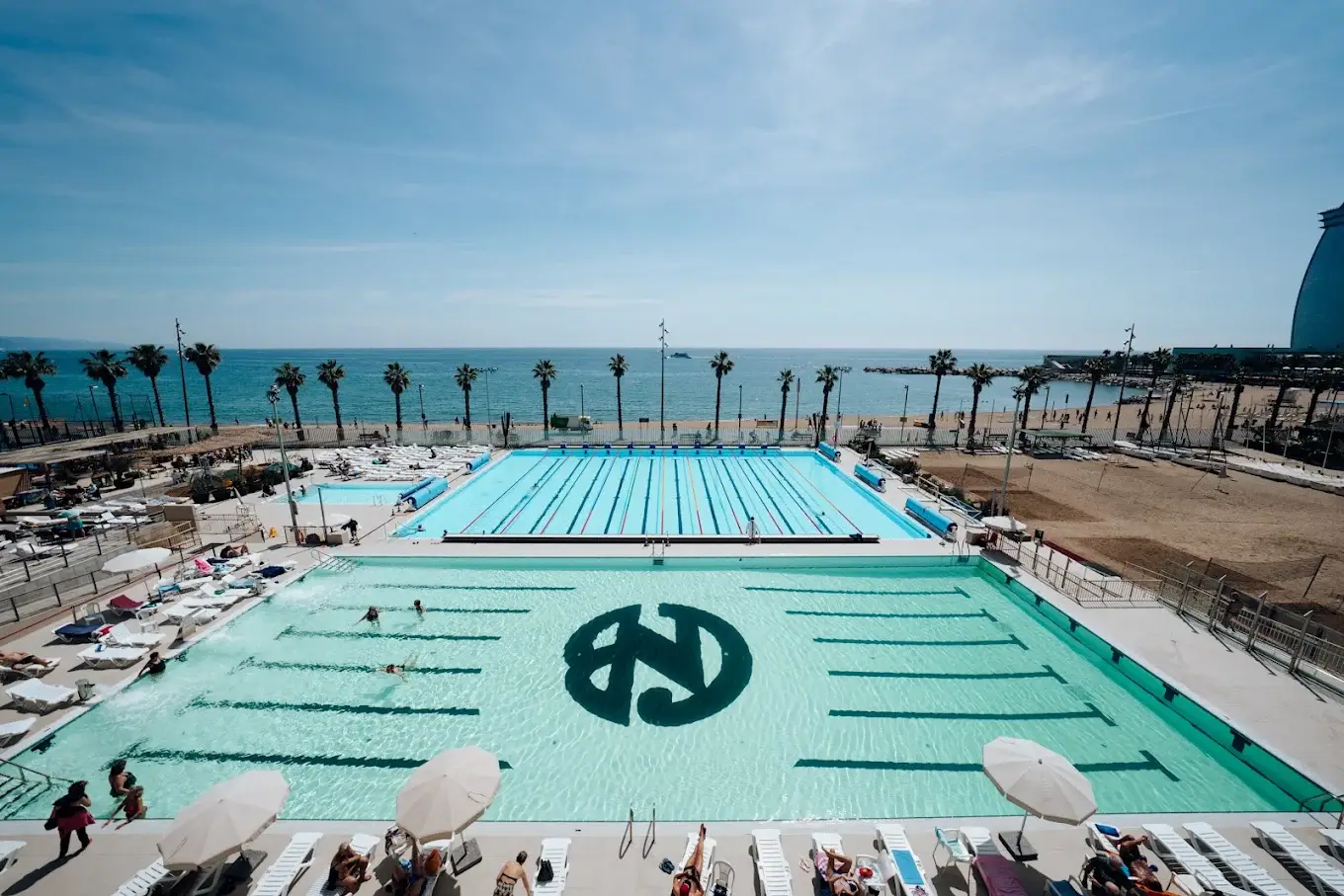 Bird's-eye view shot of Club Natació in Barcelona by the beach