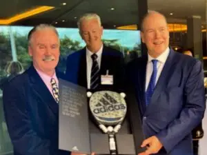 Barry presenting padel award at ceremony