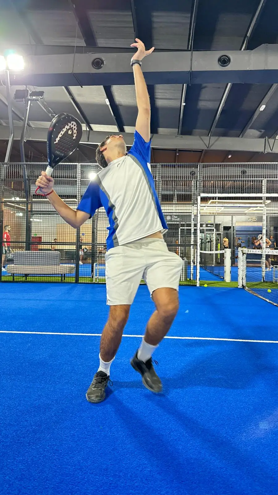 Coach Gon hitting a smash