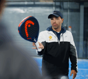 Dan, founder of British Padel Academy, coaching on court