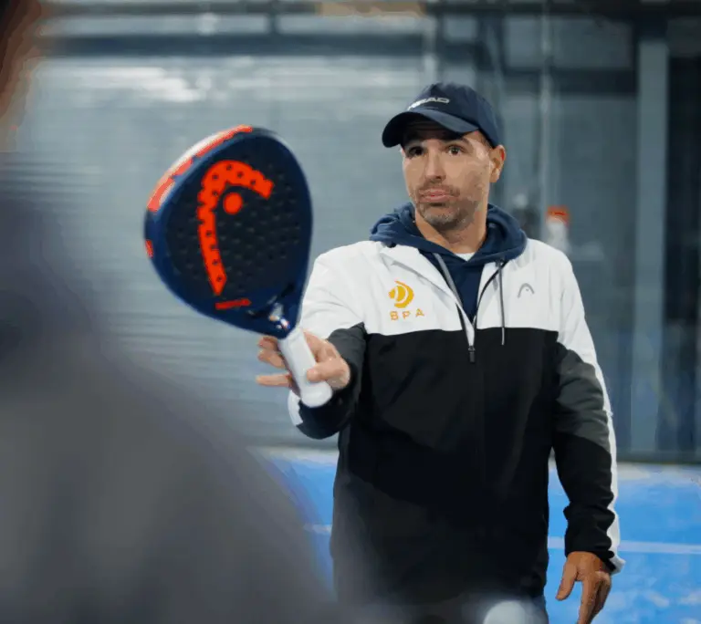 Dan, founder of British Padel Academy, coaching on court