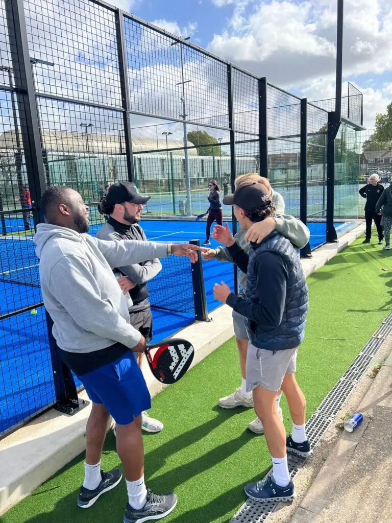 Players socialising outside court at Catford Padel Club