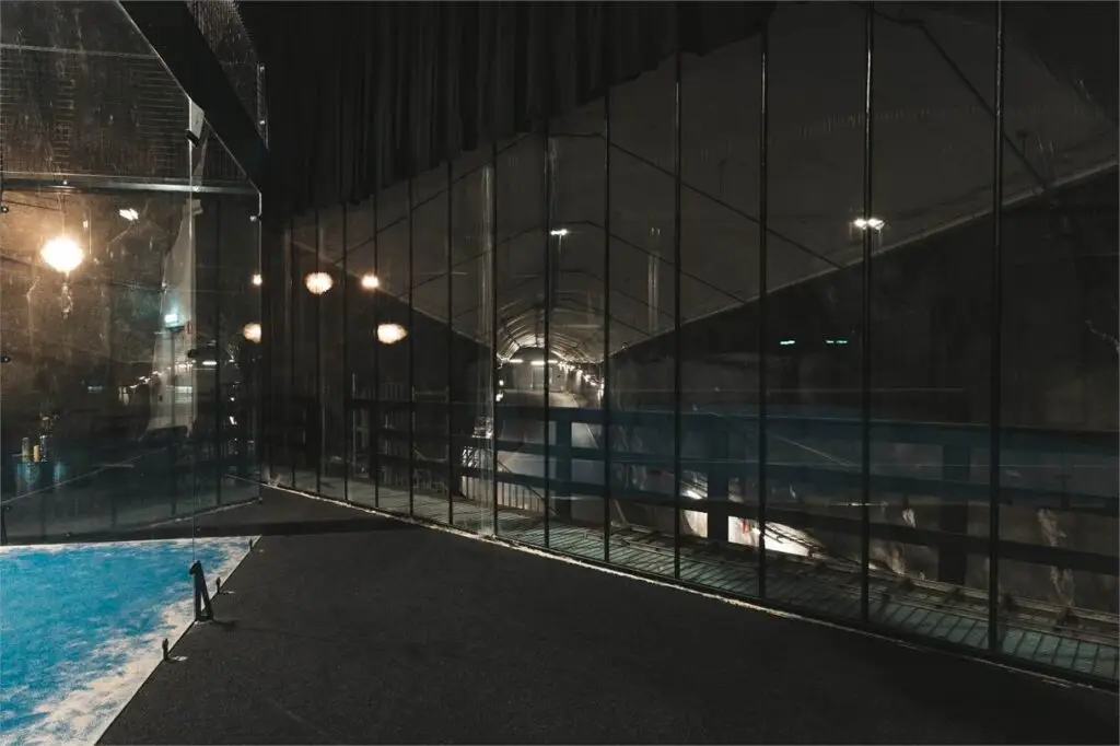 Huge glass windows inside Cave Padel