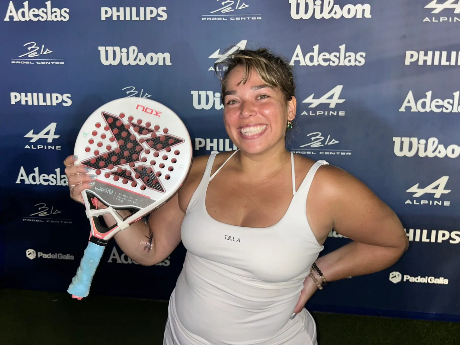 Anastasia with padel racket