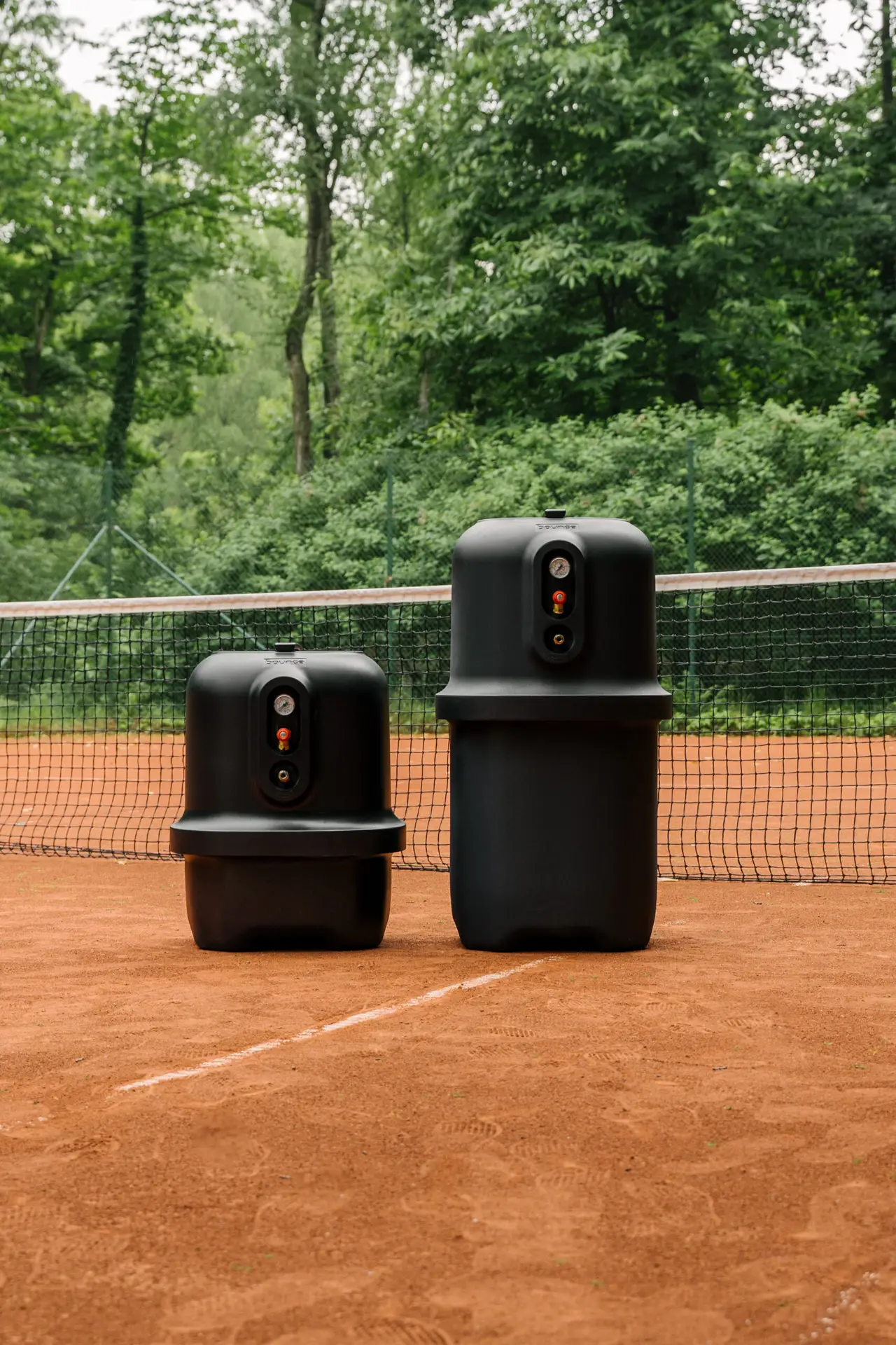 Bounce pressurisers on a tennis court