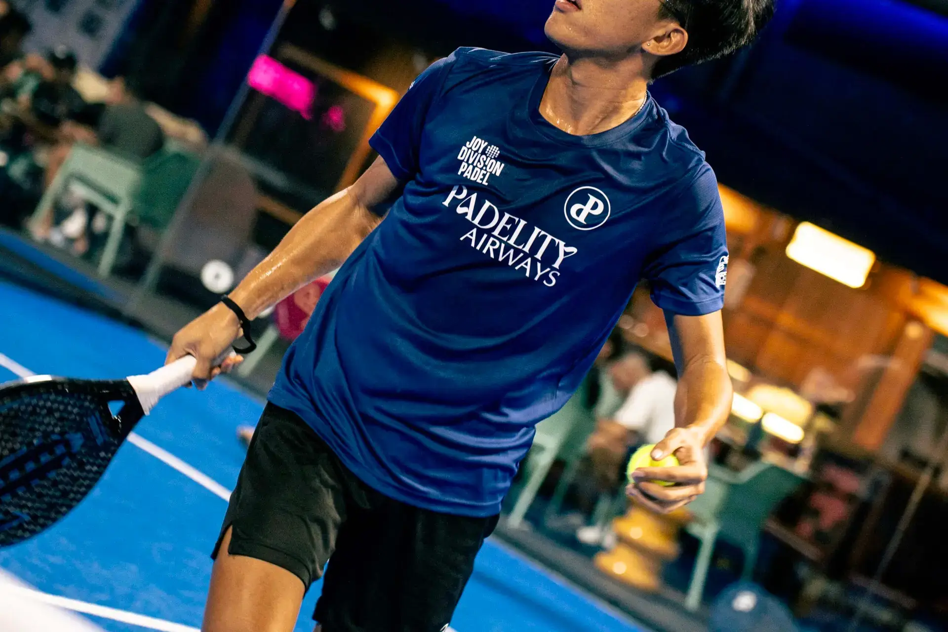 Padelity founder, Aidan, wearing Padelity