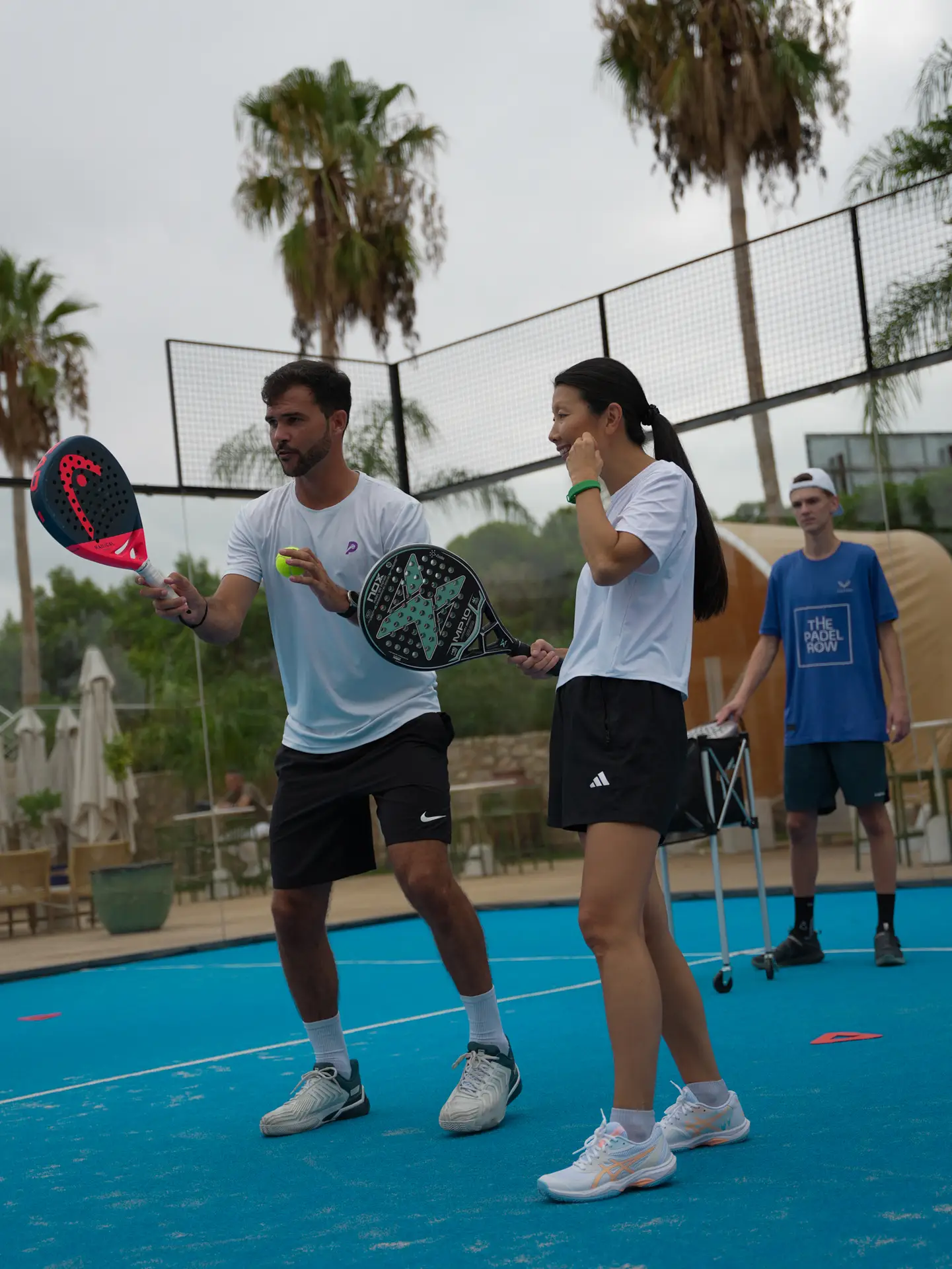 The Padel Row group on a padel court