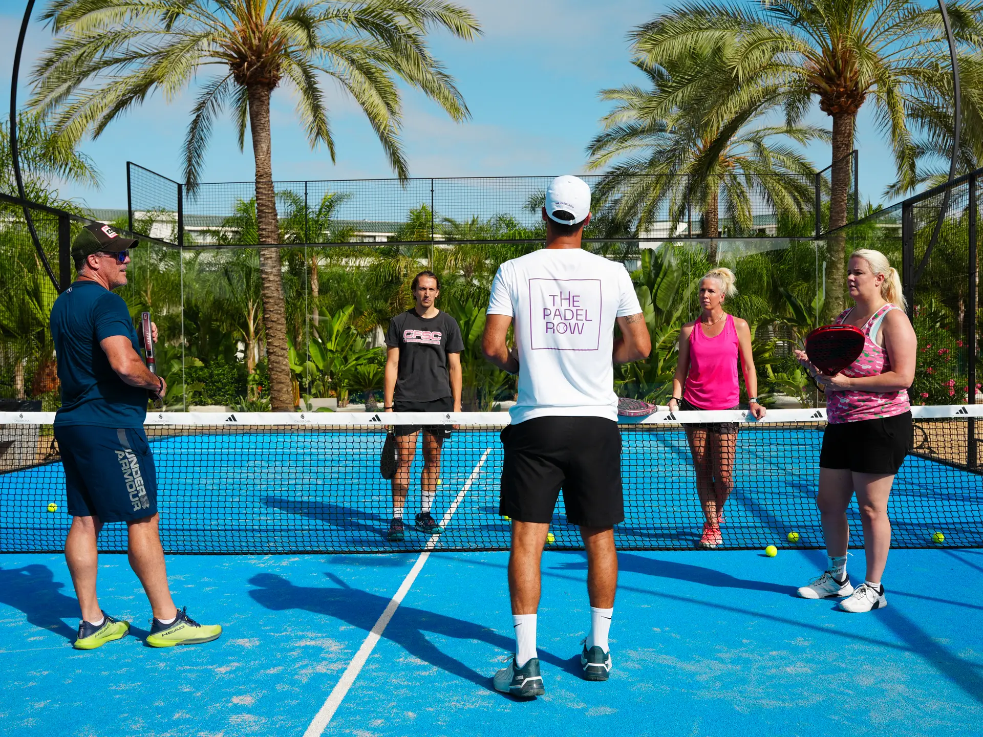 The Padel Row group on a padel court