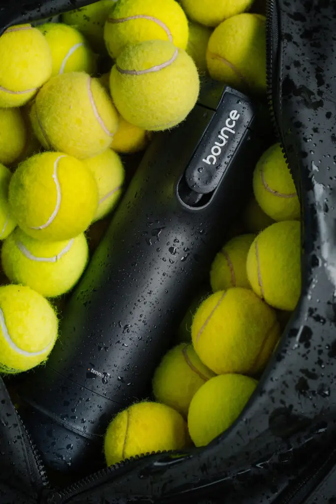 Bounce product surrounded by tennis balls