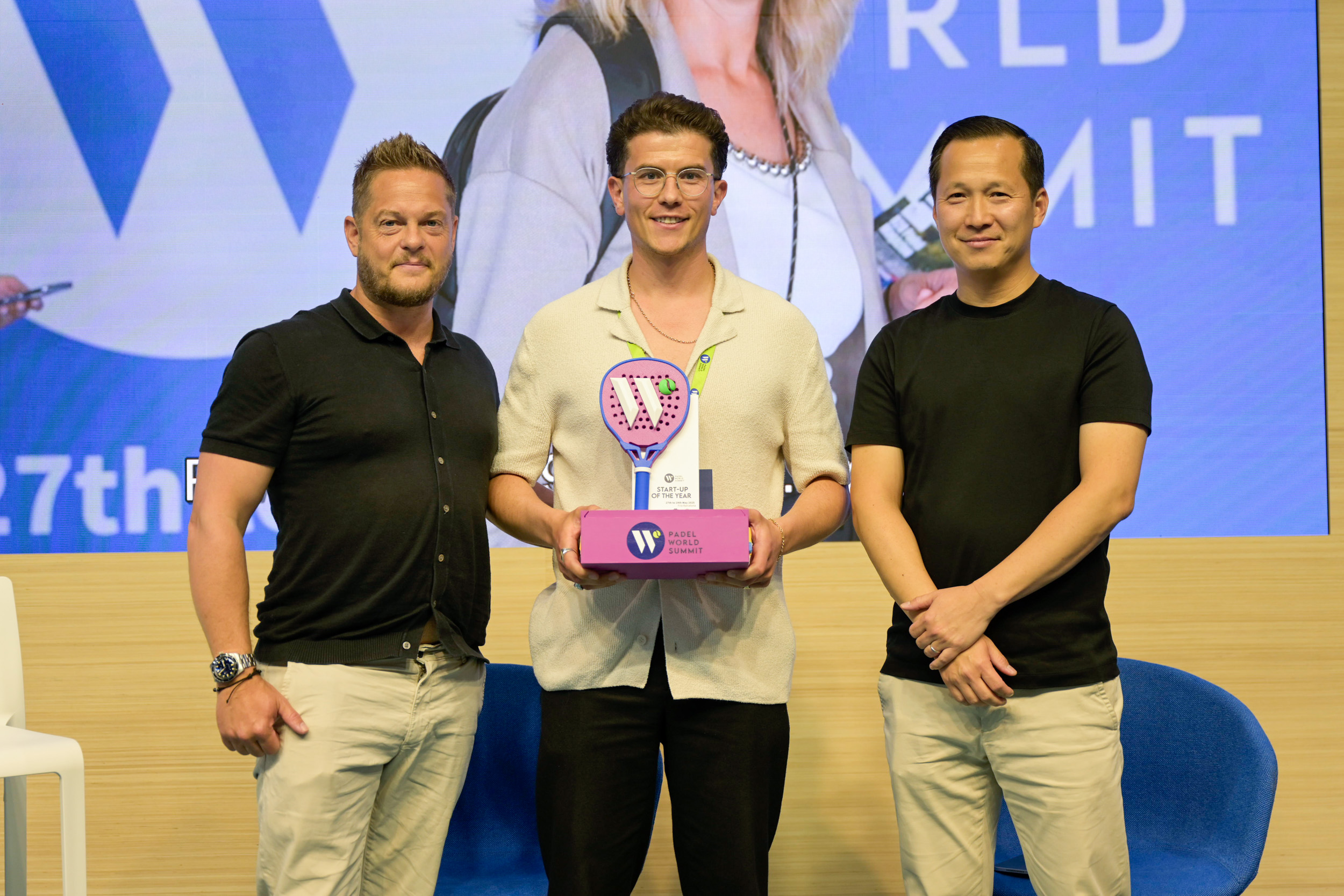 padelAI winning an award on stage at