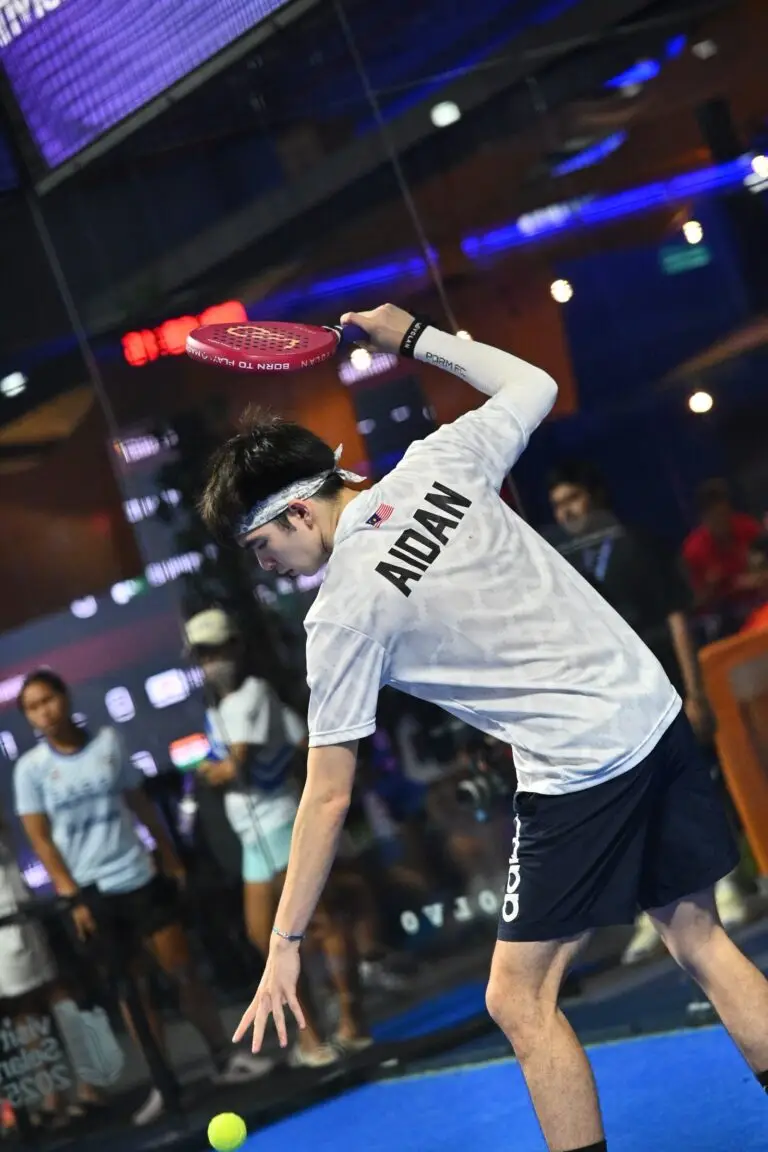 Aidan Yunus serving