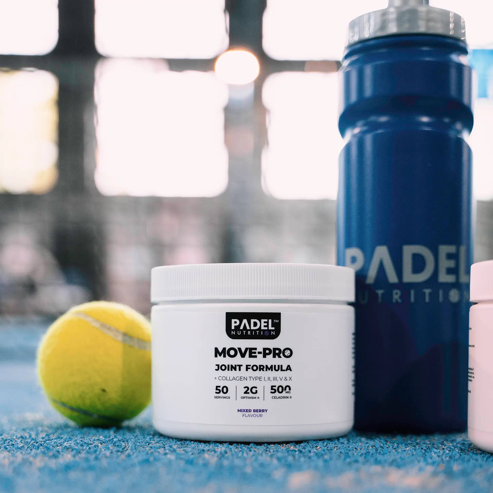 Padel ball, supplement tub and water bottle