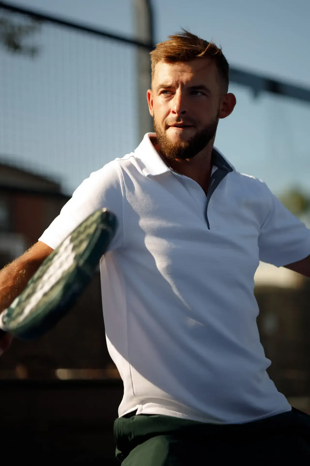 Demid Hrytsun hitting a padel shot