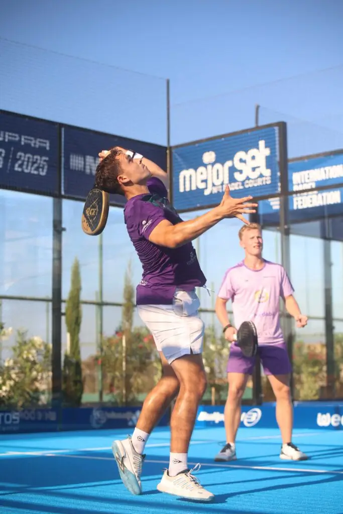 Cameron Dollimore hitting overhead padel shot