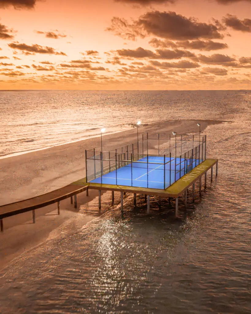 Meyyafushi Maldives overwater padel court sunset