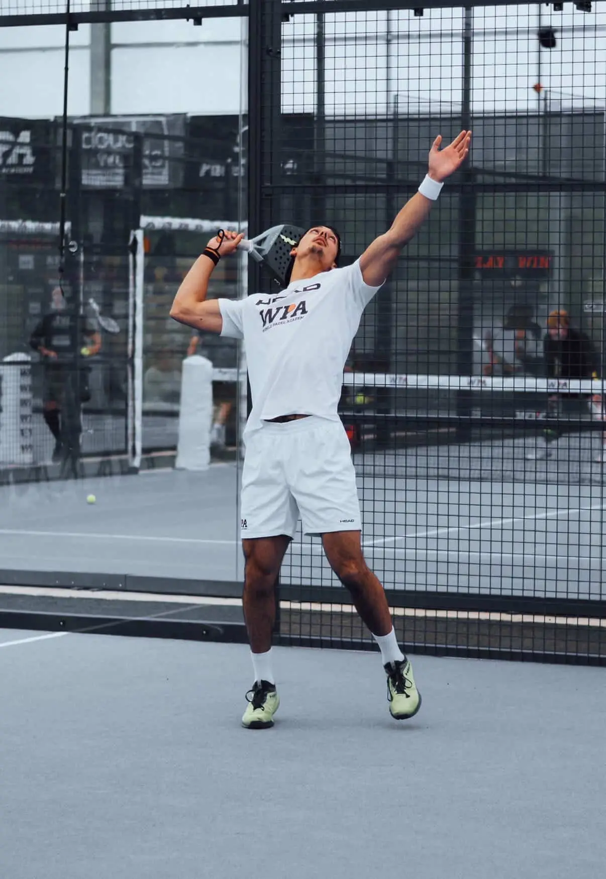 Hugo Da Silva hitting an overhead on court