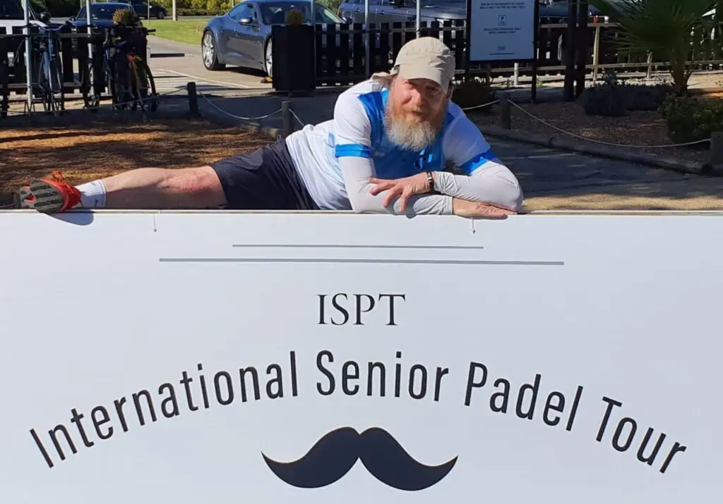 Roque Roasio posing on ISPT sign