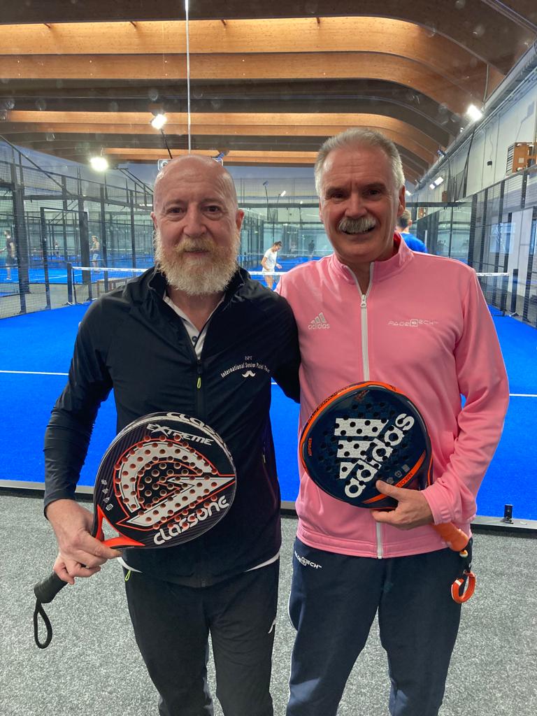 Roque Roasio and Barry Coffey next to padel court