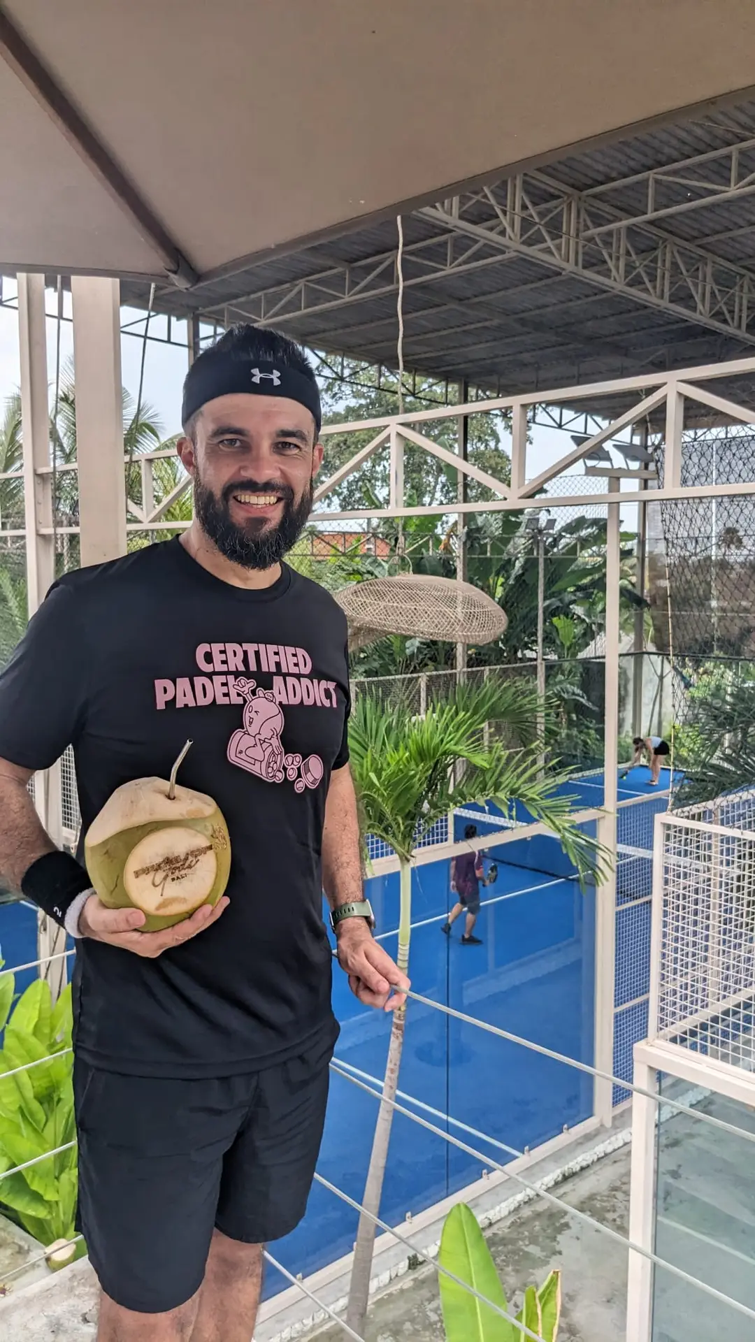 Marco by padel court with coconut water