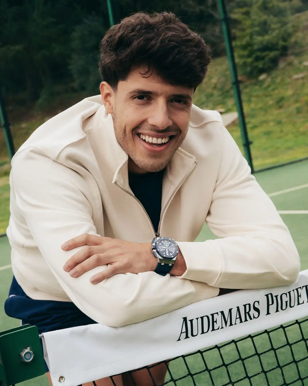 Tapia with an AP watch on a padel court