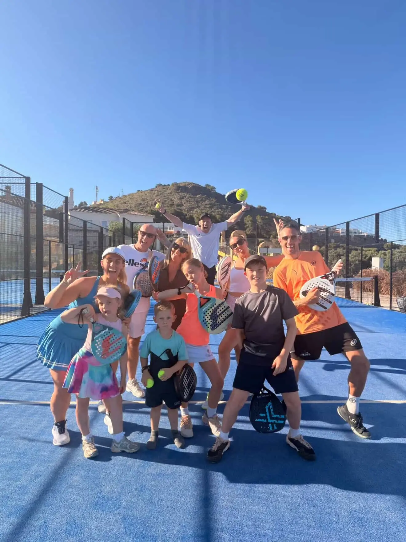 The Padel Fam Group Pic on Padel Court