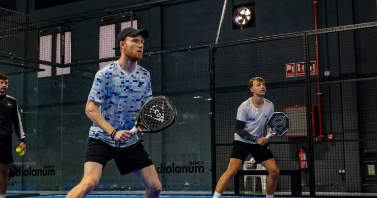 Louis Jarrold in the ready position during an indoor padel training session